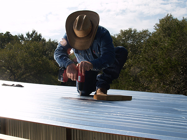 Roof Panel Being Secured
